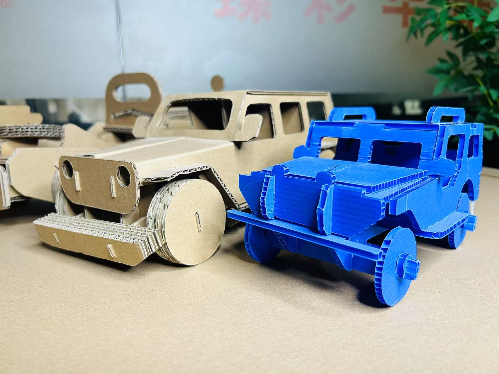 Car models made using a digital cutter.